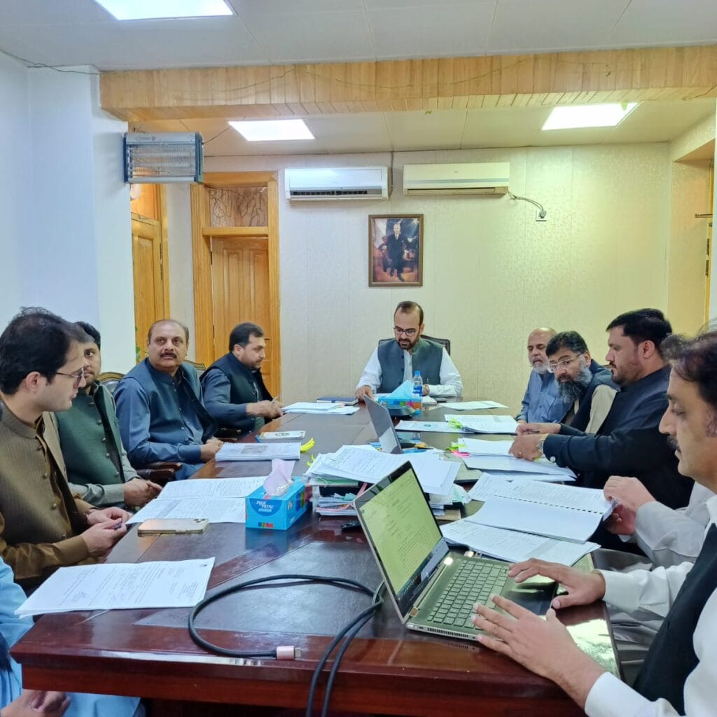 Meeting of key stakeholders, including government officials and disaster management experts, discussing initiatives for enhancing disaster preparedness and response in the province